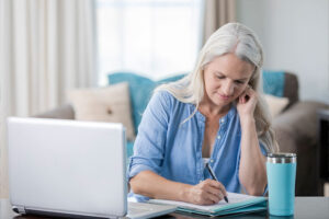 Older woman creating time management plan